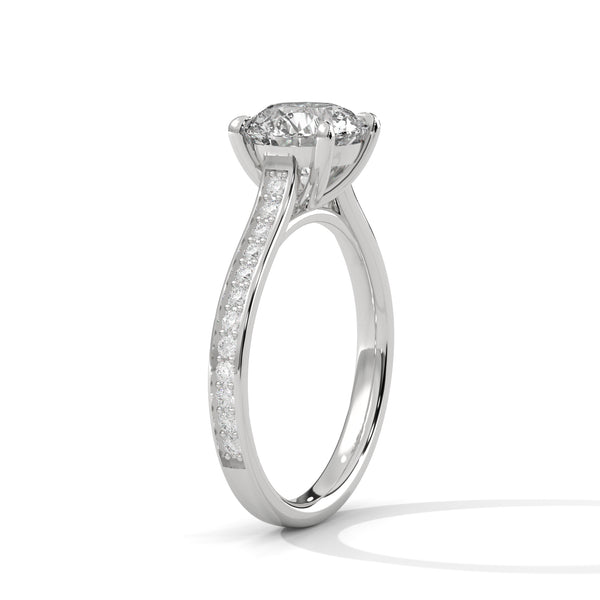 “Luna Ring—round-cut diamond brilliance, split-shank pavé elegance, and modern white-gold luxury crafted to symbolize timeless love, radiant beauty, and unforgettable moments.”