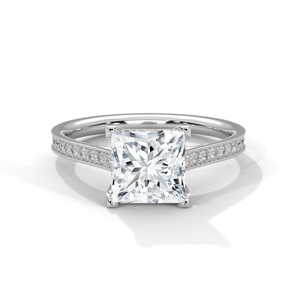“Celeste Ring—princess-cut diamond brilliance, pavé-band sparkle, and modern geometric elegance crafted to symbolize timeless love, radiant beauty, and unforgettable moments.”