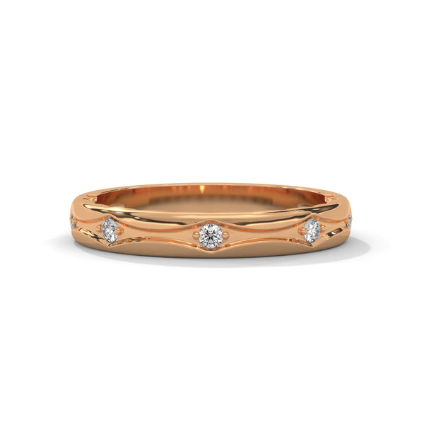 “Elegant gold diamond band crafted with flowing wave design, offering timeless beauty, refined sparkle, and premium craftsmanship for everyday luxury style.”