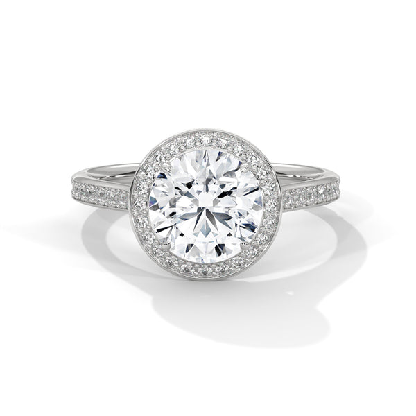 “Dazzling round halo engagement ring with pavédiamonds, premium white gold design, and brilliant sparkle—crafted for timeless luxury and unforgettable proposals.”