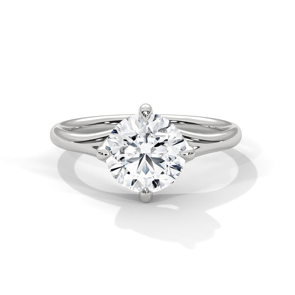 “Nova Ring—round brilliant diamond sparkle, elegant split-shank solitaire design, and modern white-gold beauty crafted to symbolize timeless love and radiant sophistication.”