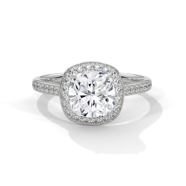 A dazzling cushion-cut lab-grown diamond encircled by a radiant halo and pavé band — timeless elegance with a modern soul.