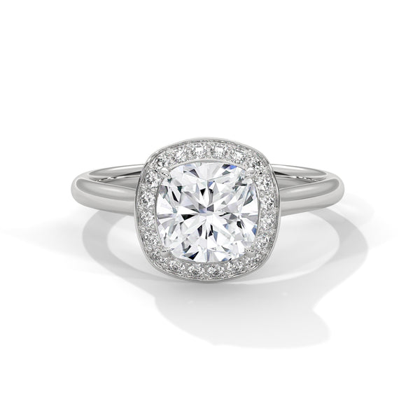 “Discover timeless elegance with this cushion-halodiamond ring in yellow gold, crafted for brilliance, luxury, and unforgettable engagement moments.”