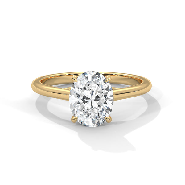 “Oval solitaire diamond ring in yellowgold—crafted for timeless elegance, radiant sparkle, and unforgettable proposals with modern luxury.”