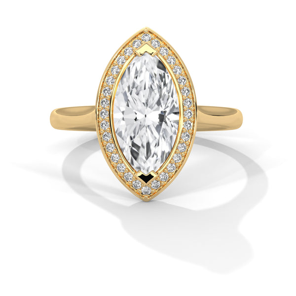 “Solara Ring—marquise-cut brilliance, sleek bezel halo, and bold modern elegance crafted to symbolize timeless love, radiant beauty, and unforgettable moments.”