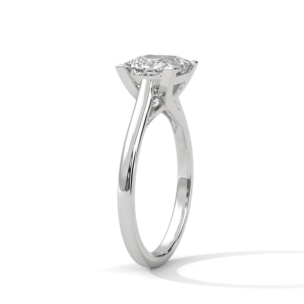 “Celeste Ring—princess-cut diamond brilliance, sleek four-prong solitaire elegance, and timeless white-gold beauty crafted to symbolize pure love, modern style, and lasting grace.”