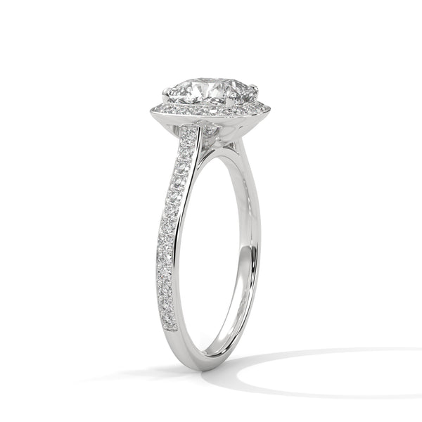 A dazzling cushion-cut lab-grown diamond encircled by a radiant halo and pavé band — timeless elegance with a modern soul.