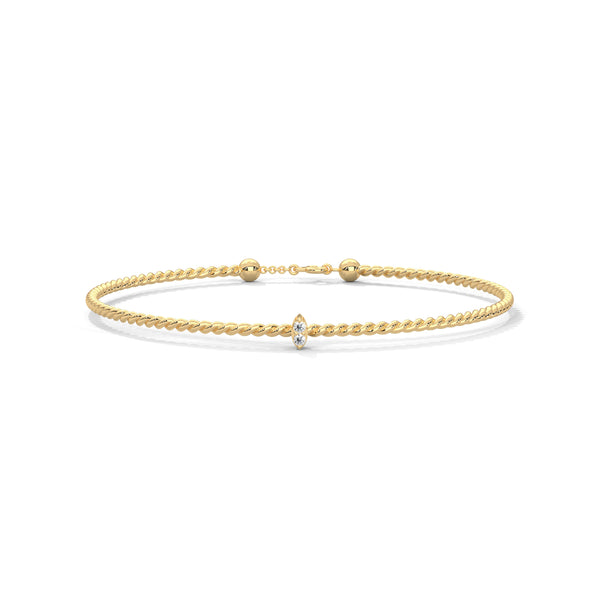 Lunara Glow is a 7-inch diamond bangle bracelet featuring 5 carats of round-cut brilliance, offering timeless elegance in a sleek, sculptural silhouette.
