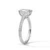 The Celestial Elegance Ring features a striking emerald-cut diamond embraced by a delicate band adorned with shimmering pave stones. A timeless piece that symbolizes everlasting love and sophistication.
