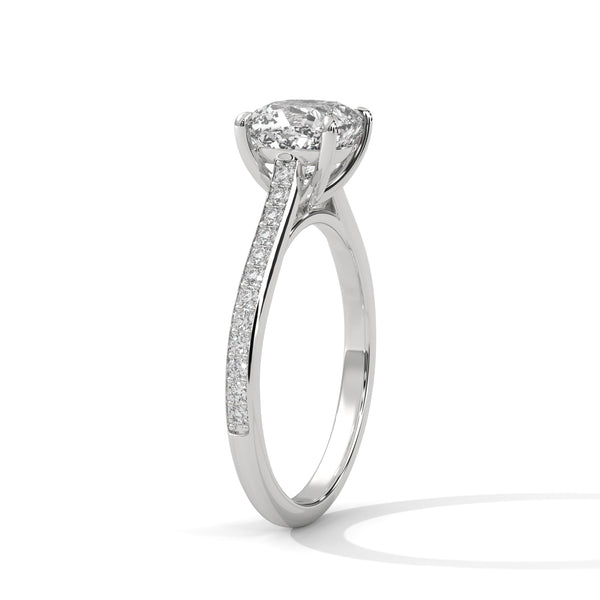 “Cushion-cut diamond solitaire ring in white gold—brilliant sparkle, pavé band elegance,and timeless luxury crafted for everlasting love.”