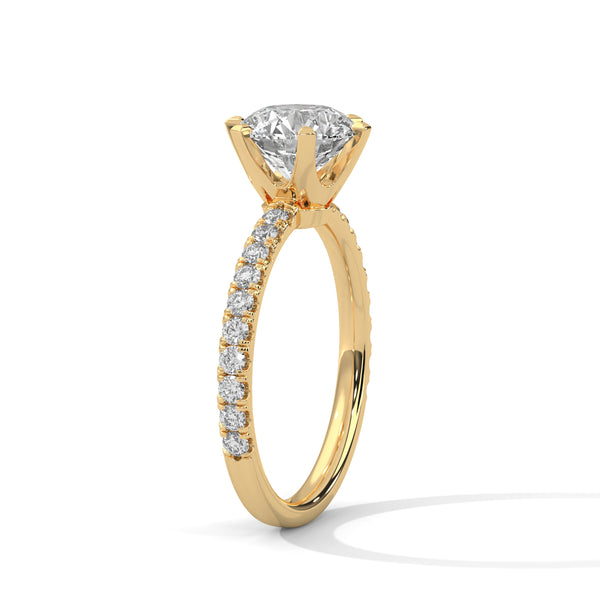 “Celestia Ring—round-cut diamond brilliance, secure six-prong elegance, and pavé-band sparkle crafted to symbolize timeless beauty, lasting love, and radiant sophistication.”