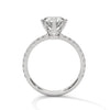 “Celestia Ring—round-cut diamond brilliance, secure six-prong elegance, and pavé-band sparkle crafted to symbolize timeless beauty, lasting love, and radiant sophistication.”