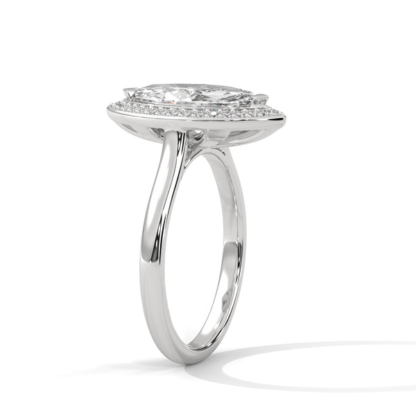 “Solara Ring—marquise-cut brilliance, sleek bezel halo, and bold modern elegance crafted to symbolize timeless love, radiant beauty, and unforgettable moments.”