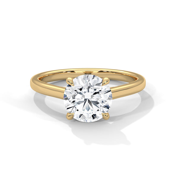 “Celeste Ring—round brilliant diamond sparkle, minimalist four-prong solitaire elegance, and timeless white-gold beauty crafted to symbolize pure love and lasting sophistication.”