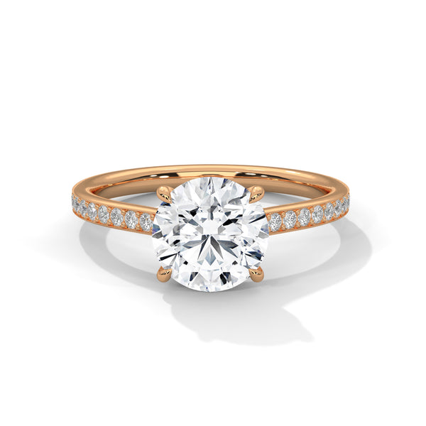“Rose-gold round diamond solitaire—brilliantsparkle, pavé-band elegance, and timeless luxurycrafted for everlasting love and unforgettablemoments.”