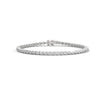 A graceful 7-inch tennis bracelet adorned with 68 marquise-shaped diamonds totaling 5.00 carats—crafted to shimmer with refined allure