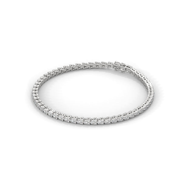 A graceful 7-inch tennis bracelet adorned with 68 marquise-shaped diamonds totaling 5.00 carats—crafted to shimmer with refined allure