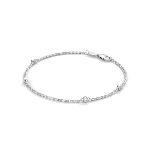 The Celestia Curve is a 5.75-inch bangle bracelet featuring 1.75 carats of 50 dazzling round-cut diamonds—crafted for a refined and radiant statement.