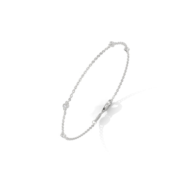 The Celestia Curve is a 5.75-inch bangle bracelet featuring 1.75 carats of 50 dazzling round-cut diamonds—crafted for a refined and radiant statement.