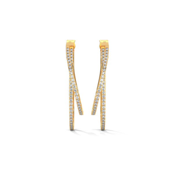 Stylishly layered gold hoops, adorned with sparkling diamonds for a bold yet elegant statement.