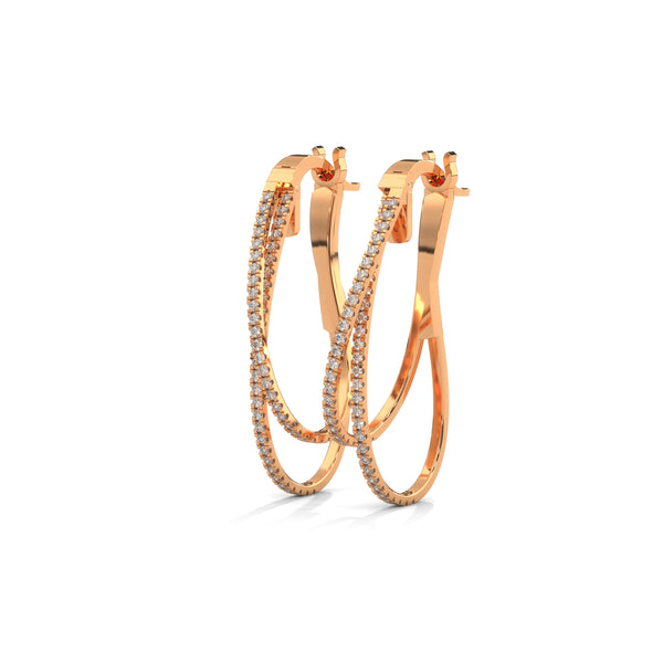 Stylishly layered gold hoops, adorned with sparkling diamonds for a bold yet elegant statement.