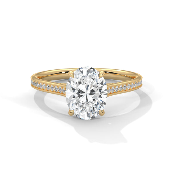 “Oval-cut diamond ring in yellow gold—brilliantsolitaire sparkle, pavé band elegance, andtimeless luxury crafted for unforgettable love.”