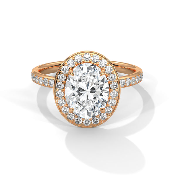 “Oval halo diamond ring in rose gold—radiantbrilliance, pavé-band sparkle, and modern luxurycrafted for timeless love and unforgettableelegance.”