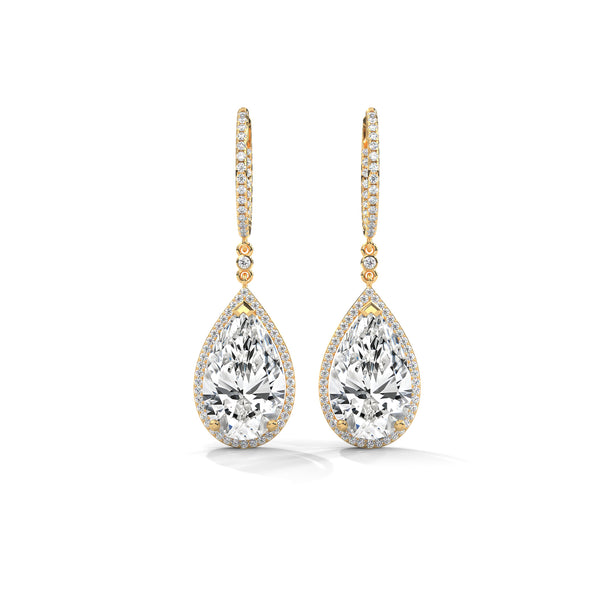 Dramatic rose gold danglers with pear-shaped centerpieces and a cascade of diamonds for breathtaking brilliance.