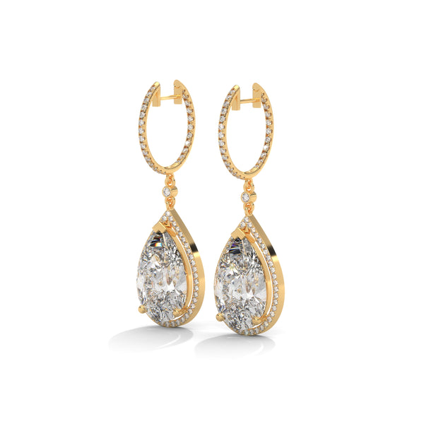 Dramatic rose gold danglers with pear-shaped centerpieces and a cascade of diamonds for breathtaking brilliance.