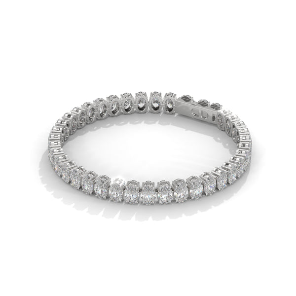 This graceful bangle bracelet features 36 round-shaped diamonds, totaling 0.76 carats, offering a subtle yet sophisticated touch of brilliance. Its 7-inch length ensures a comfortable and perfect fit.