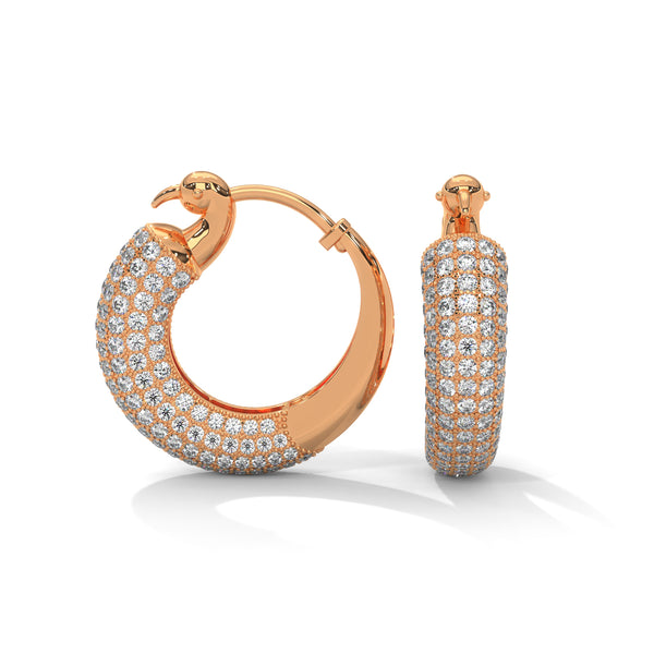 Bold gold hoop earrings encrusted with brilliant pavé diamonds and crowned with fierce panther heads.
