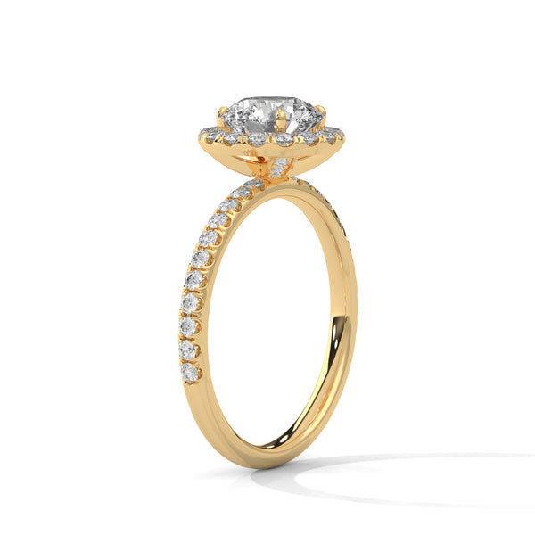 A brilliant round lab-grown diamond encircled by a halo of sparkle — timeless beauty with radiant allure.