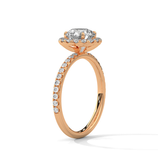 A brilliant round lab-grown diamond encircled by a halo of sparkle — timeless beauty with radiant allure.