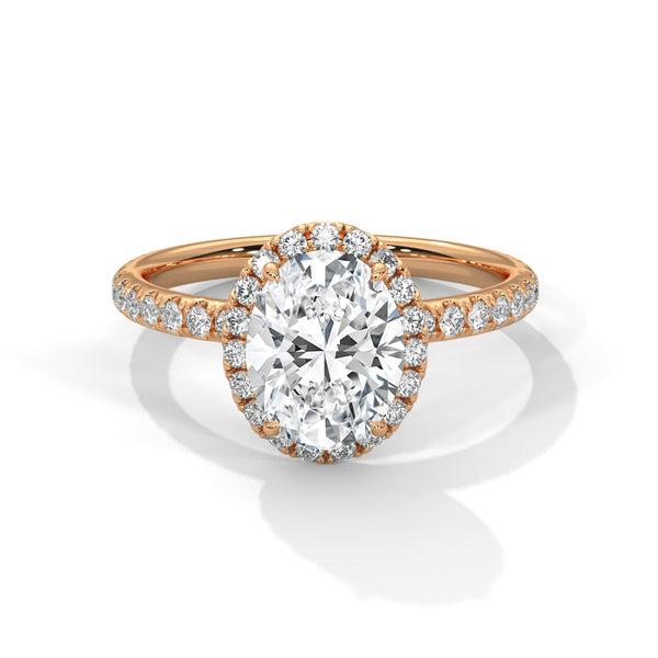 An elegant oval lab-grown diamond encased in a radiant halo — graceful, elongated beauty that sparkles endlessly.