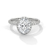An elegant oval lab-grown diamond encased in a radiant halo — graceful, elongated beauty that sparkles endlessly.