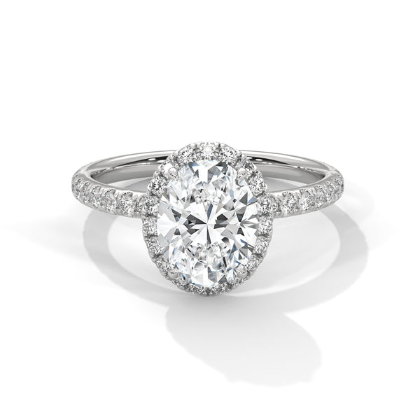An elegant oval lab-grown diamond encased in a radiant halo — graceful, elongated beauty that sparkles endlessly.