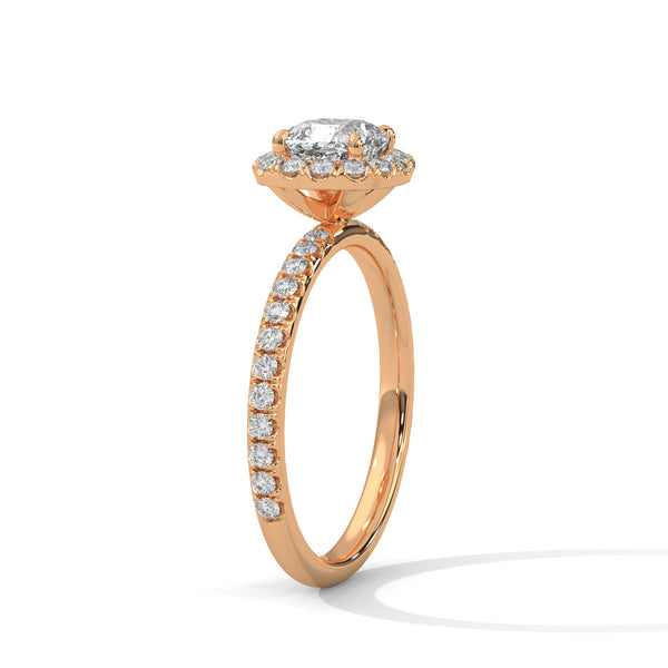 A cushion-cut lab-grown diamond surrounded by a delicate halo — timeless romance with a soft, feminine glow