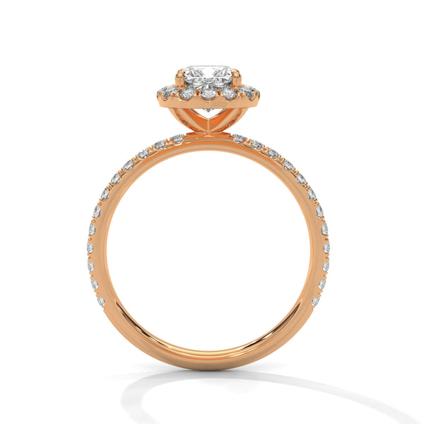 A cushion-cut lab-grown diamond surrounded by a delicate halo — timeless romance with a soft, feminine glow