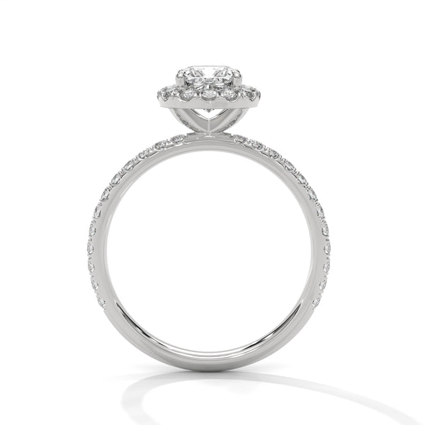 A cushion-cut lab-grown diamond surrounded by a delicate halo — timeless romance with a soft, feminine glow