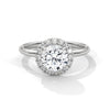 A classic round lab-grown diamond framed by a radiant halo — timeless brilliance with modern grace