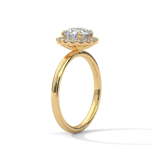 A classic round lab-grown diamond framed by a radiant halo — timeless brilliance with modern grace