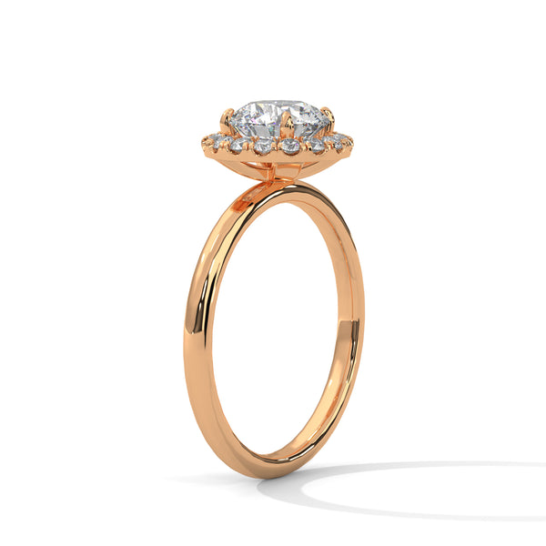 A classic round lab-grown diamond framed by a radiant halo — timeless brilliance with modern grace