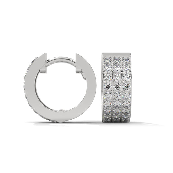Elegant yellow gold huggie earrings adorned with three radiant rows of dazzling diamonds.