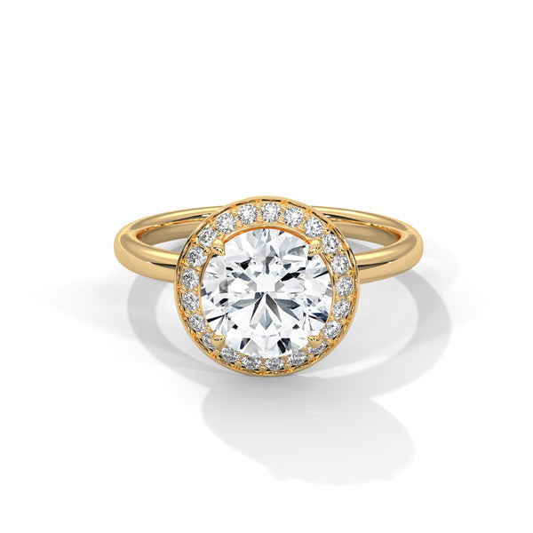 “Celestial Halo Ring—round-cut brilliance, radiant halo sparkle, and white-gold elegance crafted to symbolize everlasting love, timeless beauty, and unforgettable engagements.”