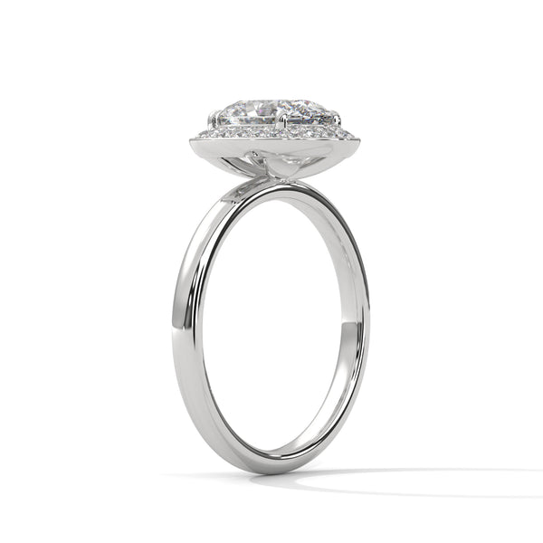 “Radiant Halo Ring—oval diamond brilliance, shimmering halo sparkle, and white-gold luxury crafted to symbolize timeless love, commitment, elegance, and unforgettable moments.”
