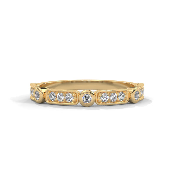 A whimsical yellow gold band featuring alternating bezel and pavé-set diamonds, creating a playful, elegant sparkle.