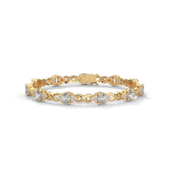 This exquisite tennis bracelet features 62 emerald-shaped diamonds, totaling 7.01 carats. With a 6.50-inch length, it is a stunning accessory that offers a perfect balance of brilliance and sophistication.