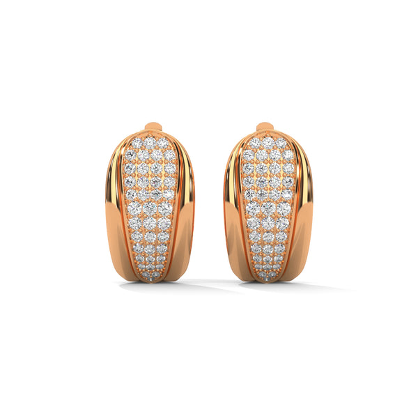 Bold yet graceful, these yellow gold huggie earrings feature a stunning tapered pavé diamond pattern for a refined sparkle.