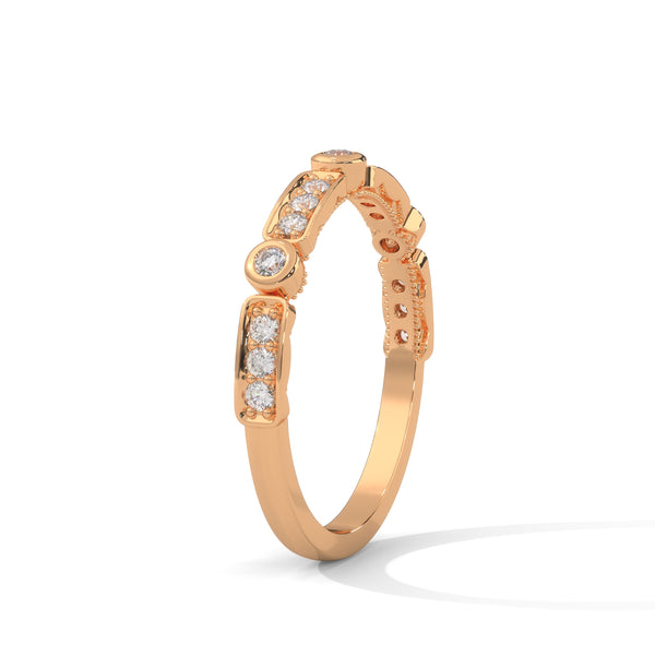 A whimsical yellow gold band featuring alternating bezel and pavé-set diamonds, creating a playful, elegant sparkle.