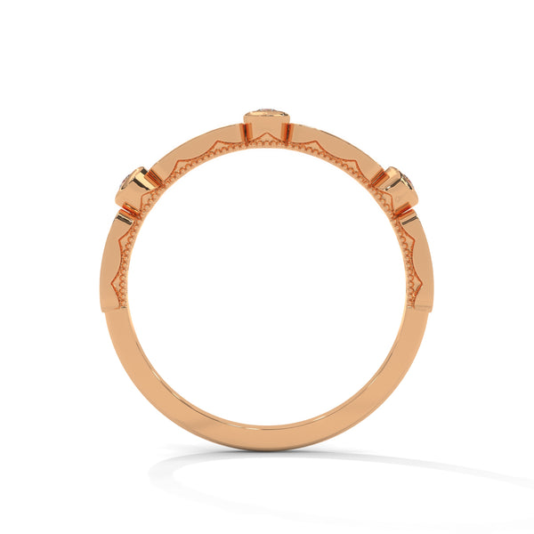 A whimsical yellow gold band featuring alternating bezel and pavé-set diamonds, creating a playful, elegant sparkle.